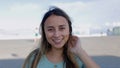 Smiling portrait of cheerful young latina woman looking at camera outdoors.hon