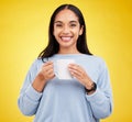 Smiling portrait, coffee mug and happy woman in a studio with a smile from espresso. Isolated, yellow background and