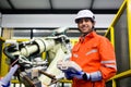 Smiling portrait of robotics engineer working and solving problems Royalty Free Stock Photo