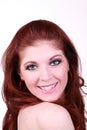 Smiling portrait young red head woman Royalty Free Stock Photo