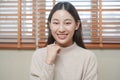 Smiling positive, attractive asian young woman wearing casual dress, portrait of beautiful brunette her with long brown hair, Royalty Free Stock Photo