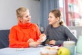 Schoolgirl taking money from her mother Royalty Free Stock Photo