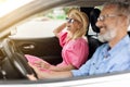 Smiling positive senior couple going summer vacation by car Royalty Free Stock Photo