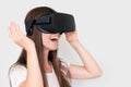 Smiling positive woman wearing virtual reality goggles headset, vr box. Connection, technology, new generation, progress Royalty Free Stock Photo