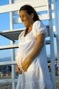 Smiling pregnant woman on the beach Royalty Free Stock Photo