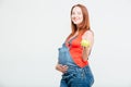 Smiling pregnant woman holding apple Royalty Free Stock Photo