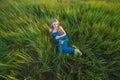 Smiling pregnant woman lying on the grass Royalty Free Stock Photo