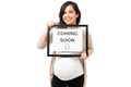 Smiling pregnant woman thrilled for the birth of her baby Royalty Free Stock Photo