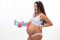 Smiling pregnant woman waiting for twins, girl and boy. Royalty Free Stock Photo