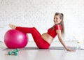 Pregnant woman doing exercises with a fit ball. Royalty Free Stock Photo