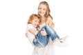 smiling preteen girl holding little brother in hands