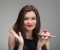 Smiling pretty girl with the cake Royalty Free Stock Photo