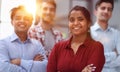 smiling pretty girl standing professionally with her arms crossed at home, hoping for a new opportunity concept Royalty Free Stock Photo