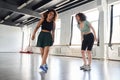 Smiling pretty women rehearsing the movements of a new dance Royalty Free Stock Photo