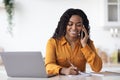 Smiling black lady independent contractor working from home Royalty Free Stock Photo