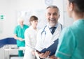 Doctor examining a patient`s medical records Royalty Free Stock Photo