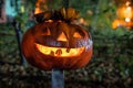 Smiling pumpkin symbol of the holiday halloween holding at night.Jack-o-lantern. Halloween festive background