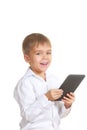 Smiling reading boy with electronic book. Isolated