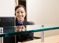 Smiling receptionist with telephone earpiece Royalty Free Stock Photo