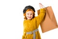 smiling red hair child holding shopping bag in hand Royalty Free Stock Photo