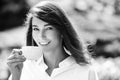 Smiling red headed woman cup coffee. Close-up portrait of young beautiful woman holding the cup of morning coffee over Royalty Free Stock Photo