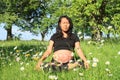 Relaxing pregnant woman with drawn baby exercising yoga