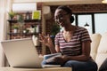 Smiling remote student attending online courses class Royalty Free Stock Photo