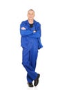 Smiling repairman with folded arms Royalty Free Stock Photo