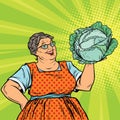 Smiling retro old woman with a head of green cabbage