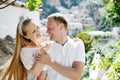 Smiling romantic couple in Positano, Italy - love concept