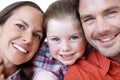 Smiling runs in the family. Close-up portrait of a young family.