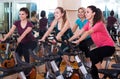 Elderly and young women working out hard in sport club Royalty Free Stock Photo