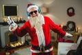 Smiling of santa claus singing a christmas songs at home Royalty Free Stock Photo