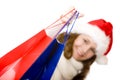 Smiling Santa Claus woman doing Christmas shopping