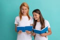 smiling school pupil and student reding books, back to school