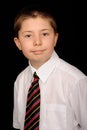 Smiling schoolboy wearing tie