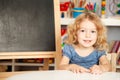 Smiling schoolchild in a class