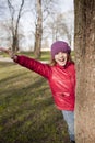 Smiling schoold age girl is in the park