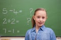 Smiling schoolgirl posing Royalty Free Stock Photo