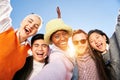 Smiling selfie of a happy group of multicultural friends looking at the camera. Portrait of cheerful multi Royalty Free Stock Photo