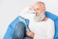 Senior man using tablet Royalty Free Stock Photo