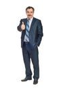 Smiling senior business man gives thumbs Royalty Free Stock Photo