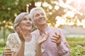 Smiling senior couple embracing in autumn park Royalty Free Stock Photo