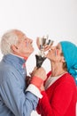 Smiling senior couple and french supporter Royalty Free Stock Photo