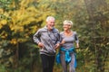 Smiling senior couple jogging in the park Royalty Free Stock Photo