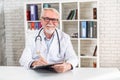 Headshot of senior male doctor, video call Royalty Free Stock Photo