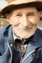 Smiling senior man in hat