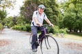 Senior Man Riding Bicycle Royalty Free Stock Photo