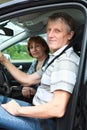 Smiling senior man and woman in car Royalty Free Stock Photo