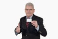 Smiling senior manager with card posing thumbs up Royalty Free Stock Photo